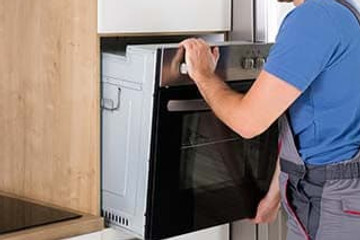 man-fitting-built-in-oven.jpg