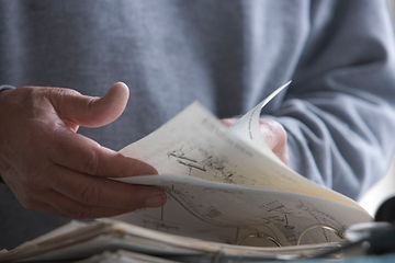 man-looking-through-a-manual.jpg